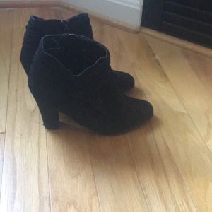 Boots with bow on side.